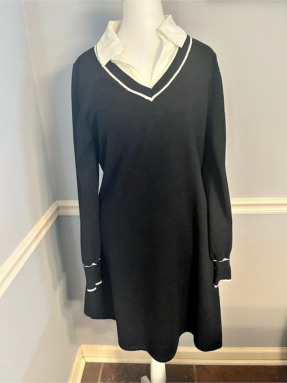 Black sweater dress with white collar